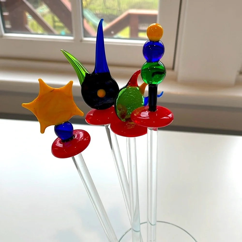 Set of four hand blown glass stir sticks in primary colors. Vintage. EUC.